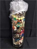 VERY LARGE LOT OF COSTUME JEWELRY IN VASE