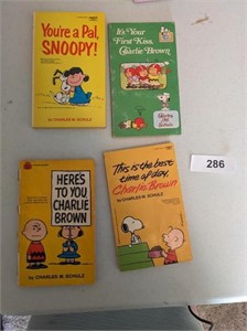 (4) Charlie Brown Paperback Books