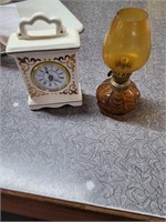 Clock and oil lamp