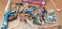 Misc tools, hammer, caulk gun, tie downs, c