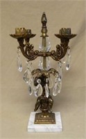 Putto and Crystal Almond Prism Candelabrum.