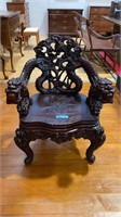 HIGHLY CARVED ORIENTAL ARM CHAIR W/FOO DOGS