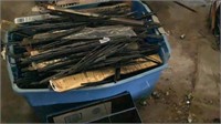 Plastic tote full of various size wipers and