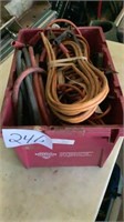 Plastic tote jumper cables and extension cord