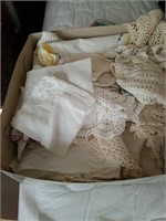 Box of beautiful linens, dollies, and table