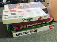 STACK OF BOARD GAMES INCLUDES NFL STRATEGY