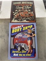 Torque brothers and lucky’a body shop metal signs