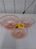 Nest of pink depression mixing bowls