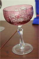 A Cranberry Cut Glass Wine Goblet