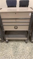 Napa tool box with drawers and open top lid . On