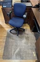 Blue office chair & plastic pad