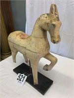 antique wooden horse mounted on display