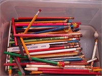 Container of mostly advertising pencils