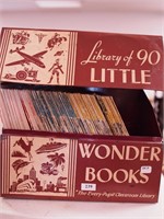 Tin box marked "Library of 90 Little Wonder