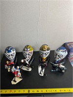 Vintage hockey helmet and action figures