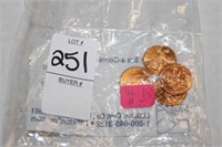 FOUR UNCIRCULATED PENNIES