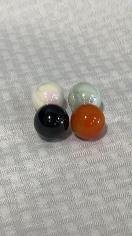 4 shooter logo marbles.