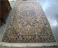 A  hand woven Persian Tabriz Rug