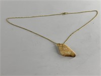 Ancient ivory section on a chain