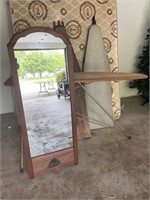 Three vintage ironing boards and wood framed