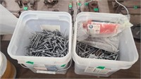 2 CONTAINERS OF LARGE SCREWS