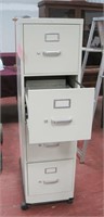 4 drawer metal file cab in rollers
