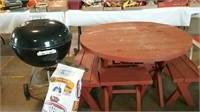 Wood picnic table and Weber grill