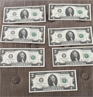 (7) two dollar bill with consecutive serial