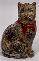 Cast iron cat bank, (paint worn), 4.25" tall,