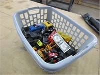 Basket full of toy cars and trucks