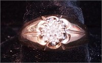 A men's yellow gold and diamond ring marked 14K,