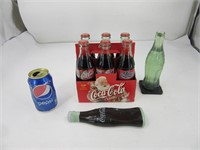 Caisse de 6 bouteilles + serres livres Coca-Cola