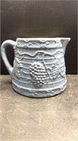Early grape and trellis stoneware pitcher in the