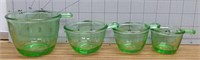 Green glass measuring cups