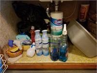 Under sink lot of misc cleaning supplies
