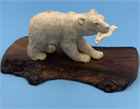 Phenomenal moose antler carving of a bear with his