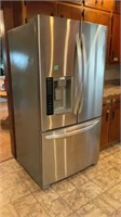 Side-by-side LG refrigerator with icemaker