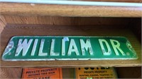 William Dr. metal sign