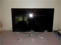 One-Lg Flat Screen TV with metal stand