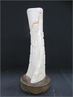 ORIENTAL FIGURE ON WOODEN STAND (RESIN)