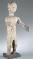 Fante figure with articulating arms, 20th century.