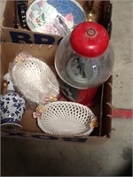 Box of ceramic baskets and gumball machine
