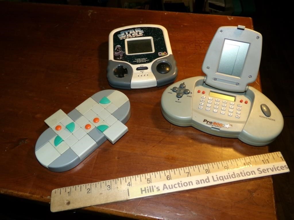 Three Handheld Gaming Systems