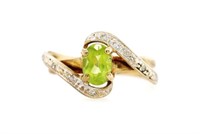 Peridot, diamond and 9ct yellow gold ring