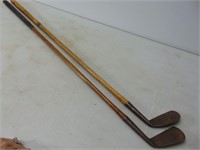 Two Old Wood Golf Clubs