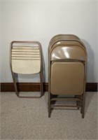 Seven Metal Folding Chairs