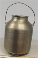 Stainless steel or Aluminum pot with handle.