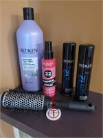 4 unused Redken products and one brush