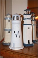 3 lighthouses one holds a candle