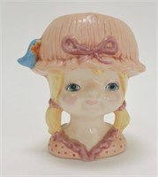 Girl with pigtails head vase 4 1/4"